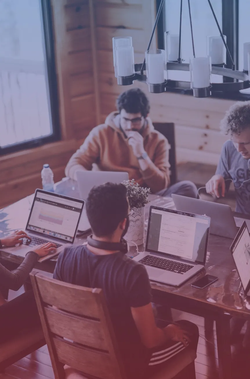 Group of people working on their laptops